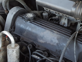Cómo Probar La Compresión Del Motor (1991-1995 2.5L Caravan y Voyager) Cómo Probar La Compresión Del Motor (1991-1995 2.5L Caravan y Voyager)